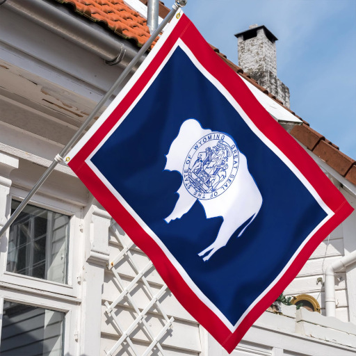 Flag of Wyoming flying from the side of a house